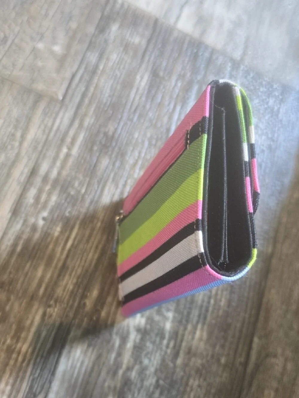 kate spade striped trifold wallet in lime green, hot pink, black, white, blue